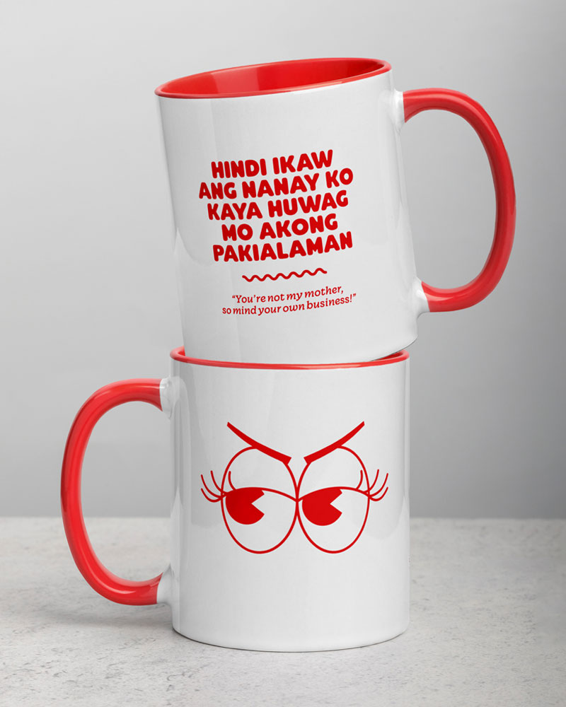 two red mugs stacked on one another