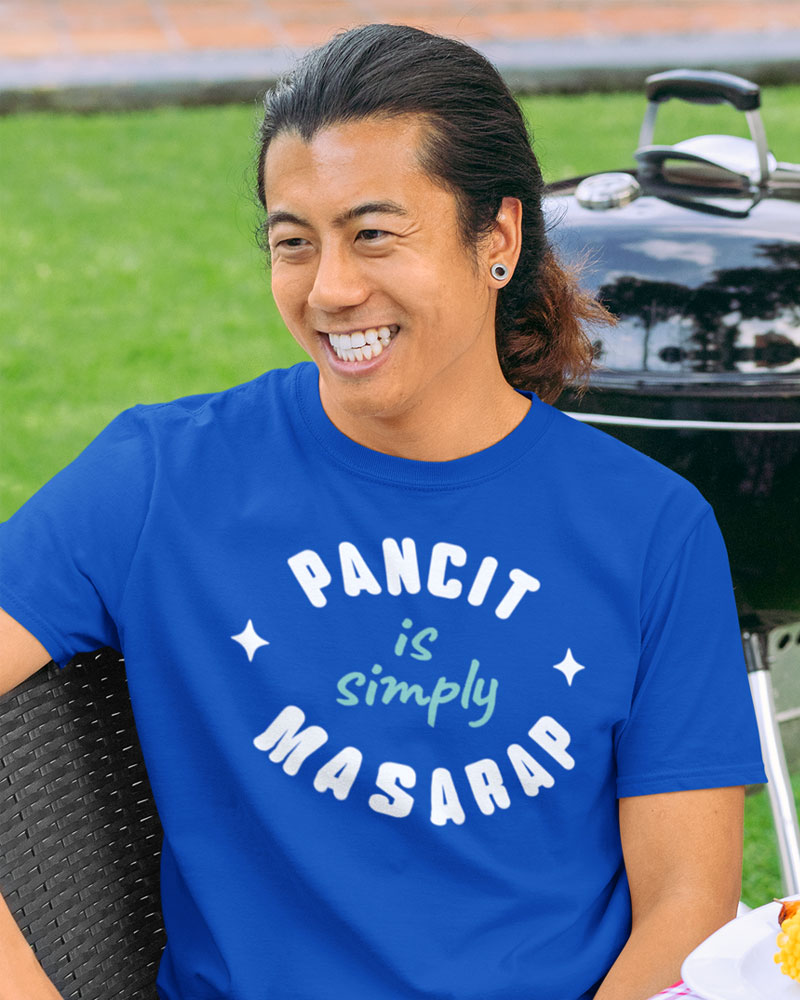 Man at barbecue wearing t-shirt